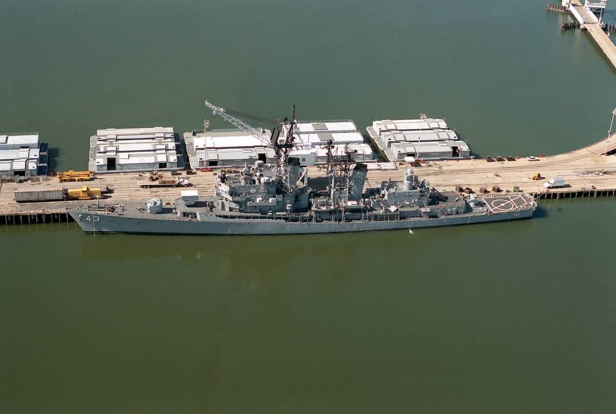 USS Dahlgren (DDG-43) at the pier at Naval Weapons Station Yorktown, 1990.